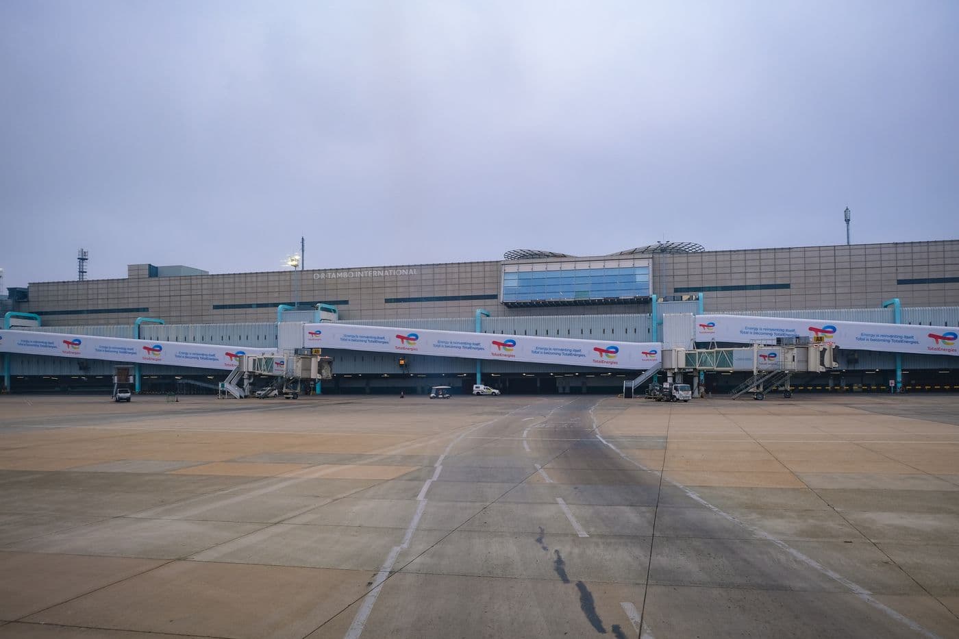 Airport jet bridges leading out to the runway